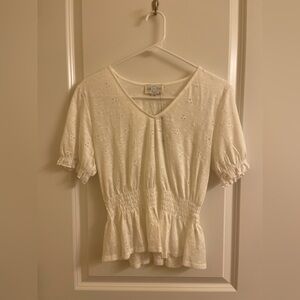 NEW WITH TAGS! White/Cream colored short sleeved peplum (eyelet) top